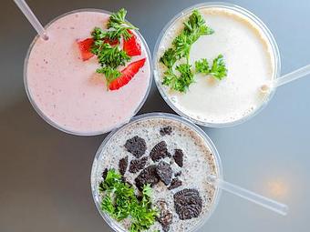 Product: Milkshakes made with Cajou vanilla cashew ice cream.  Available in Oreo, Strawberry and Vanilla. - The Land of Kush in Mount Vernon - Baltimore, MD Soul Food Restaurants