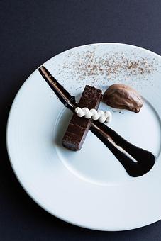 Product: flourless chocolate cake, theo chocolate ice cream, chili chocolate sauce, dark cocoa meringue - The Mansion Restaurant at Rosario Resort & Spa in Rosario - Eastsound, WA Locally Sourced Restaurants