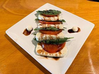 Product: Caprese Appetizer - The Outpost On Gandy in Saint Petersburg, FL American Restaurants