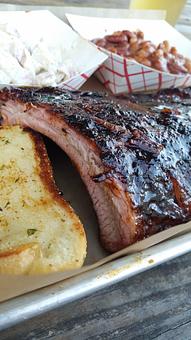 Product: Pepsi-Cola Glazed Baby Back Ribs - The Pig & Pint in Historic Fondren - Jackson, MS Barbecue Restaurants