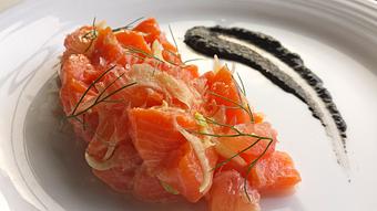 Product: Wild Sockeye Salmon Crudo with Ruby Pink Grapefruit, Shaved Fennel, and Meyer Lemon-White Soy finished with a Black Garlic-Squid Ink Puree - The Plaza Café in Southampton Village - Southampton, NY American Restaurants