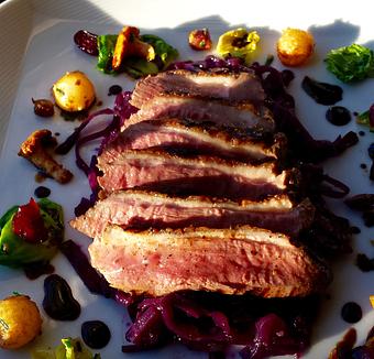 Product: braised and spiced red cabbage, brussel sprout leaves, hedge hog mushrooms, pancetta, sun dried cranberries, orange-balsamic syrup - The Plaza Café in Southampton Village - Southampton, NY American Restaurants