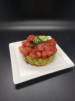Product: Ahi tuna*, avocado & cucumber, served on a house made brown rice cracker - The Pressed Penny Tavern in Kansas City, MO American Restaurants