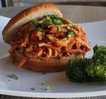 Product: Trumpet mushrooms with tangy BBQ sauce served on our own fresh GF Bun - The Pureganic Cafe in Downtown Rye - Harrison, NY Jewish & Kosher Restaurant