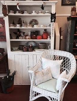 Product: WHITE CUPBOARD & WHITE WICKER CHAIR - The Sampler in Hudson in Hudson, OH Shopping & Shopping Services