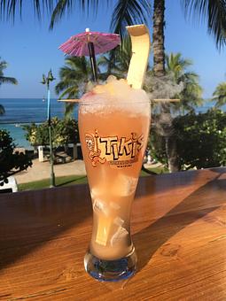 Product: Son of an Itch:
Scratch your itch with this smokin' dry ice hand-crafted drink featuring Jack Daniel's, pineapple & lilikoi juices, topped with Kraken Rum. Tiki's take-home glass and served with a souvenir back scratcher for your enjoyment! - Tikis Grill & Bar in Waikiki - Honolulu, HI Bars & Grills