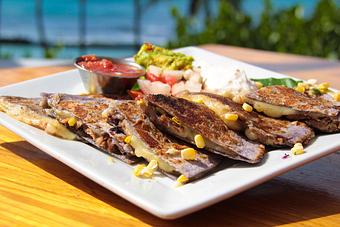 Product: A favorite since we opened in 2002 - try it and you'll understand why. - Tikis Grill & Bar in Waikiki - Honolulu, HI Bars & Grills