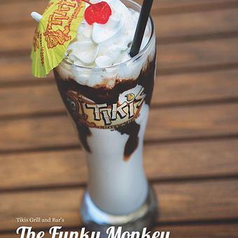 Product: Funky Monkey! 
A chocolate and banana shake, this one is in a Take home Glass! Add a few bucks. - Tikis Grill & Bar in Waikiki - Honolulu, HI Bars & Grills