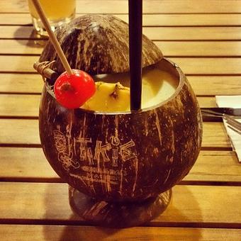 Product: Coladas in Coconuts
Order any of our flavored pina coladas - mango, peach, banana, raspberry - and get it served in your very own take home souvenir coconut. - Tikis Grill & Bar in Waikiki - Honolulu, HI Bars & Grills