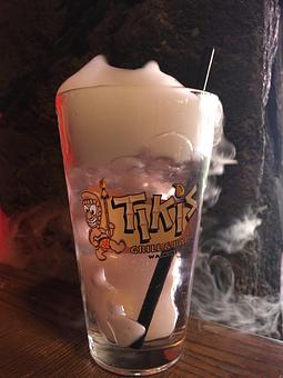 Product: Bubbling drinks in take-home 20oz glasses! - Tikis Grill & Bar in Waikiki - Honolulu, HI Bars & Grills