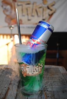 Product: Packs a punch with Grey Goose vodka, Bombay Sapphire gin, Bacardi Superior, Blue Curacao with Red Bull over dry ice. - Tikis Grill & Bar in Waikiki - Honolulu, HI Bars & Grills