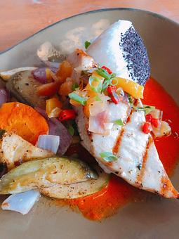 Product: Catch of the day with mango scented grilled pineapple pepper relish & roasted pepper vinaigrette. Served with steamed white rice & chef's choice vegetables. - Tikis Grill & Bar in Waikiki - Honolulu, HI Bars & Grills