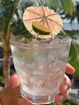 Product: Fresh lime juice, house made ginger syrup, shaken together with Gin, and topped with soda water. Refreshing! - Tikis Grill & Bar in Waikiki - Honolulu, HI Bars & Grills