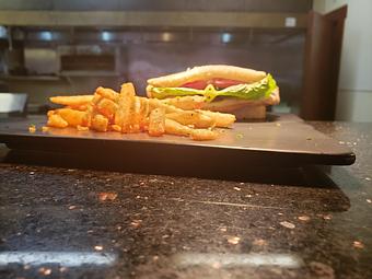 Product: Served with Fries and a choice of claim chowder or lobster bisque - Tomahawk Steak, Chops, and Seafood in San Ramon, CA American Restaurants