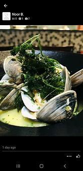 Product: Steamed with white win butter sauce. - Tomahawk Steak, Chops, and Seafood in San Ramon, CA American Restaurants