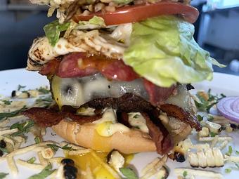 Product: Burger with Bacon and egg. - Tomahawk Steak, Chops, and Seafood in San Ramon, CA American Restaurants