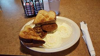 Product: two eggs with patty sausage and toast - Tommy's Restaurant in Grand Island, NE Sandwich Shop Restaurants