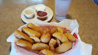 Product: choose up to 3 items- onion chips, cheese sticks, and fried mushrooms - Tommy's Restaurant in Grand Island, NE Sandwich Shop Restaurants