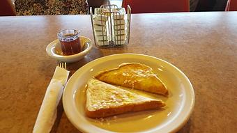 Product: One slice French toast - Tommy's Restaurant in Grand Island, NE Sandwich Shop Restaurants