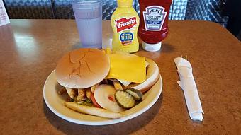 Product: one patty hamburger with cheese - Tommy's Restaurant in Grand Island, NE Sandwich Shop Restaurants