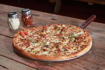 Product: Our white pizza is a work of are by creating a rich white spread of  Ricotta Feta Cheese blended base. - Townies Pizzeria in Fernandina Beach, FL Italian Restaurants