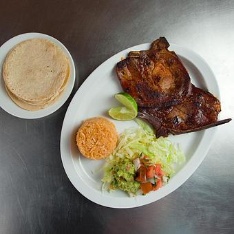 Product: Seared Pork Chops-Chuletas - Tucan Tacos in Grand Island, NE Mexican Restaurants