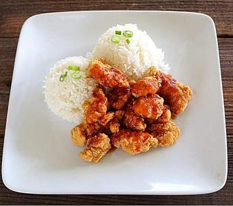 Product: Breaded breast chunks that are fried and placed over rice then drizzled with our Famous BBQ Sauce. - Turo Cafe and Grill in San Francisco, CA Coffee, Espresso & Tea House Restaurants