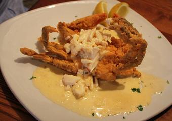 Product: Softshell crab with lump crabmeat tossed in a lemon butter sauce. - Two Tony's Restaurant in New Orleans, LA Italian Restaurants