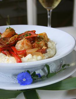 Product: shrimp, smoked sausage, bell peppers, stone ground grits, onion-bacon gravy - Virginia's On King in Historic Downtown Charleston - Charleston, SC American Restaurants