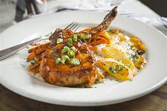 Product: Grilled Pork Chop - Virginia's On King in Historic Downtown Charleston - Charleston, SC American Restaurants