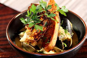 Product: shrimp, mussels, clams, red snapper, 1/2 lobster tail, yellow curry, lemongrass, coconut milk, lime, ginger, chili, garlic, white wine, paprika toast (GFO) - Washington Prime in South Norwalk, CT American Restaurants