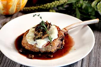 Product: thick-cut, parmesan breaded, wild mushrooms, prosciutto, artichoke hearts, fontina, mozzarella, parsley, luxardo butter sauce (GF) - Washington Prime in South Norwalk, CT American Restaurants