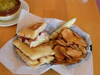 Product: Grilled Turkey & Brie - Turkey, brie, apple slices, cranberry chutney on panini - West Allis Cheese & Sausage Shoppe in West Allis, WI Coffee, Espresso & Tea House Restaurants