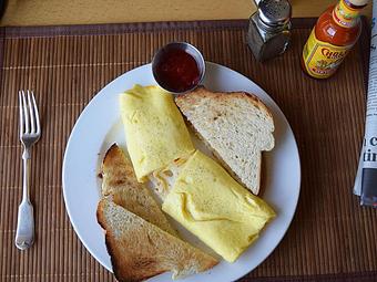 Product: Three Cheese Omelet - Three eggs, cheddar, mozzarella, pepper jack served with toast - West Allis Cheese & Sausage Shoppe in West Allis, WI Coffee, Espresso & Tea House Restaurants