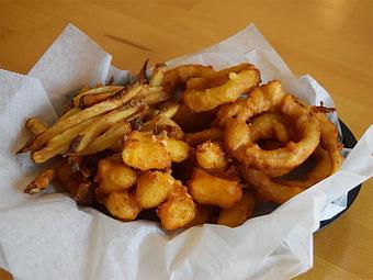 Product: Sampler Platter - Cheese curds, french fries, and onion rings with house sauce - West Allis Cheese & Sausage Shoppe in West Allis, WI Coffee, Espresso & Tea House Restaurants