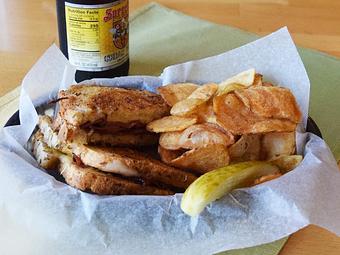 Product: Grilled Pastrami - with swiss cheese & brown mustard on rye bread - West Allis Cheese & Sausage Shoppe in Milwaukee, WI Meat Products