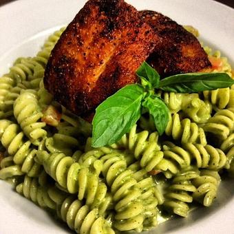Product: Blackened Mahi on pesto pasta - Woody's Tupelo in Tupelo, MS Hamburger Restaurants