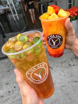 Product: Left: Tea with House Rainbow Fruit Balls. Right: Mango Chamoy with extra Fresh Mango - Y Tea Cafe in Garden Grove, CA Sandwich Shop Restaurants