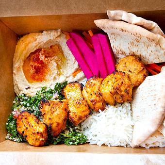 Product: Chicken Kebab Super Plate (shown in takeout container) - Zendiggi Kebab House in Closter, NJ Middle Eastern Restaurants