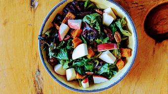 Product: Local greens, roasted pumpkin, Honeycrisp apple, toasted pecans and pepitas, balsamic vinaigrette - Longtable Beer Cafe in Downtown Middleton - Middleton, WI American Restaurants