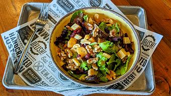 Product: Mixed greens, roasted parsnip and rutabaga, dried cranberry, toasted walnut, maple dijon vinaigrette - Longtable Beer Cafe in Downtown Middleton - Middleton, WI American Restaurants