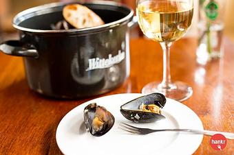 Product: Prince Edward Island mussels, in garlic, shallot, white wine & butter broth. Served with Frites and Clasen baguette. - Longtable Beer Cafe in Downtown Middleton - Middleton, WI American Restaurants
