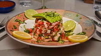 unclassified: Gulf shrimp marinated with lime juice, tomatoes, onions, cilantro, avocados & jalapeños. - Madaline's Grill & Steak House in Redmond, OR American Restaurants