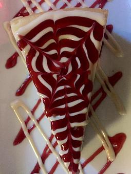 Product: Tennessee Cheesecake with Raspberry Sauce - 440 Main in Bowling Green, KY Bars & Grills