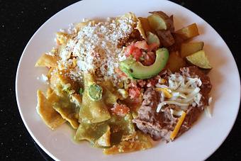 Product: Chilaquiles green or red sauce, served with refried pinto beans and potatoes - Adelitas Taqueria, Bar and Restaurant in San Jose, CA Mexican Restaurants