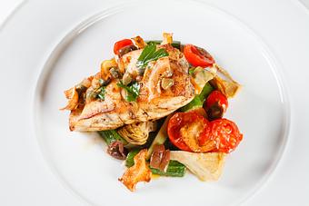 Product: Brown butter seared black grouper, zucchini, cherry tomatoes, artichokes,
Taggiasca olives, capers, cauliflower puree - Angelina’s Ristorante in Bonita Springs, FL Italian Restaurants