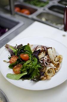 Product: Grilled calamari with spring mix salad - Arturo Boada Cuisine in Tanglewood - Memorial  - Houston, TX American Restaurants