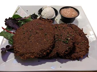 Product: Jewish style potato pancakes, a holiday classic - Ashley's Restaurant in Across from the University of Michigan Campus in the heart fo the State Street Shopping District. - Ann Arbor, MI American Restaurants