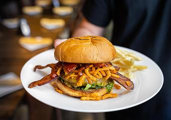 Product: House ground short rib and bistro filet, Applewood smoked bacon, Bourbon BBQ, crispy onion strings, lettuce, tomato, brioche bun - Back Bistro in Palladio - Folsom, CA American Restaurants