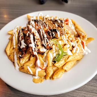Product: Cajun Chicken Pasta - Bella Milano in Springfield, IL Pizza Restaurant